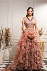 Embellished choli paired with ruffle skirt and dupatta.